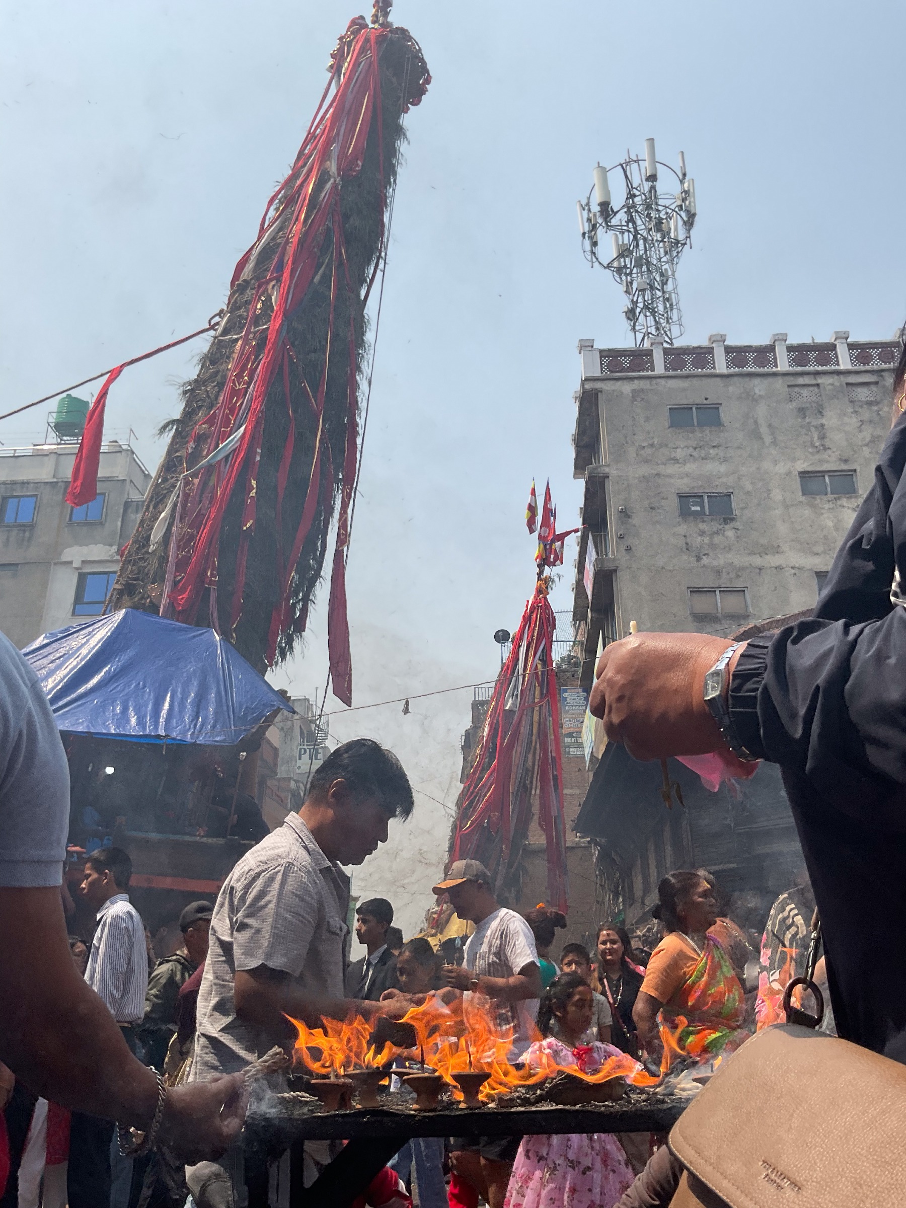 Devotees make offerings during the Rato Machindranath Jatra, one of Nepal's most ancient festivals.

The festival traces its roots to the reign of King Narendra Deva in the 6th century, when a 12-year drought gripped the Kathmandu Valley. Legend holds that the sage Gorakhnath, angered by a lack of respect, had subdued the nine Nagas responsible for bringing rain. Only the summoning of Machindranath from Assam in northeast India broke the curse. The rains returned. Each year, as the dry season gives way to the monsoon, chariots are pulled through Lalitpur and Kathmandu to honour that deliverance.

The festival's enduring power lies in what it remembers: that human wellbeing depends on natural cycles, and that their disruption carries consequences. Today, Kathmandu regularly ranks among the world's most polluted cities, its air during the dry season reaching hazardous levels. Air pollution can contribute to a host of health problems, including pneumonia, bronchitis,

conjunctivitis, and skin allergies in the short term, and more severe conditions such as stroke, heart disease, lung cancer, and kidney disease over time.

With its deep-rooted connection to natural cycles - and their disruption - the Rato Machindranath Jatra festival offers a poignant lesson, reminding us of the enduring bond between humans and the environment