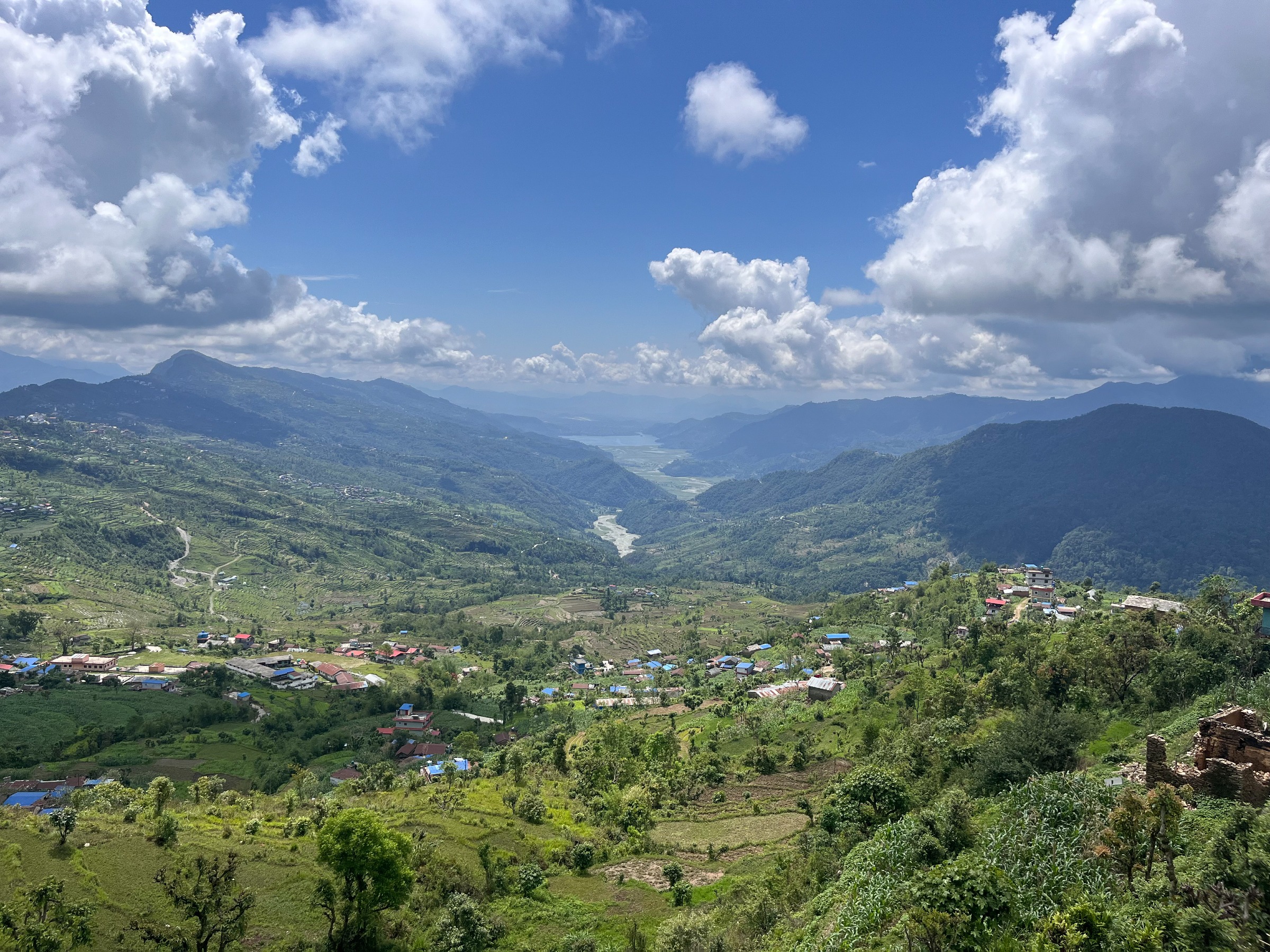 The Seti River Valley is a lush, green expanse sitting just outside Pokhara in Nepal's Gandaki Province. The river flows into Lake Phewa at the city's northern edge, but it carries more than water.

During storms, sediment gathers in the valley and flows into the lake, where it settles permanently, slowly filling the lakebed from the northwest. The consequences are serious: reduced lake capacity is limiting irrigation in nearby farmland, while sediment prevents oxygenation of lakebed flora, shrinking fish populations and harming overall biodiversity.

Though sedimentation is a natural process, it has been significantly accelerated by road construction in the upper valley and by increasingly concentrated monsoon rainfall driven by climate change. In addition, the construction is a contributing factor in multiple landslides.

Several solutions are being employed to slow the flow. Agricultural terraces, primarily built for hillside farming, double as barriers that reduce erosion and allow groundwater recharge. Rainwater pipes channel water downhill in a more controlled, less erosive way. Closer to the lake, dams along the Seti River catch sediment. Some of this is collected and sold as construction material.

These measures have had some success, but sediment is still accumulating at an alarming rate. Without more ambitious intervention, Lake Phewa - a body of water central to Pokhara's ecology, agriculture and identity - faces a troubled future.