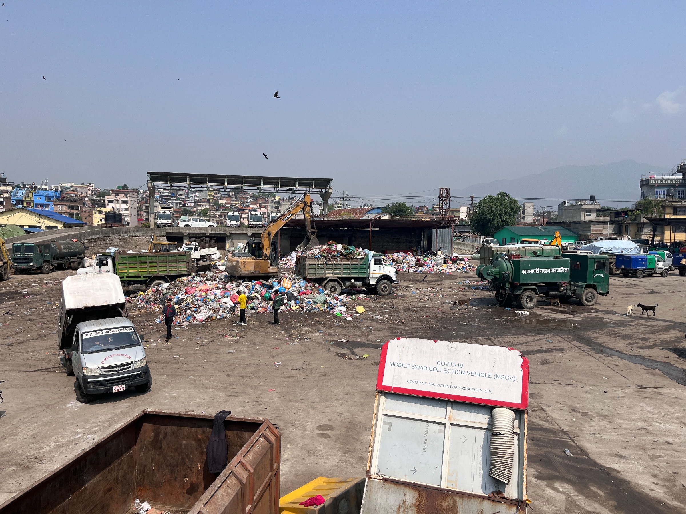 A decommissioned COVID-19 swab collection vehicle sits on the edge of a busy waste management site in Kathmandu.

Kathmandu collects and sorts waste across the city before transporting it to landfills on the valley's outskirts. Limited landfill capacity has historically caused backlogs, though recent infrastructure improvements have helped ease the strain.

Waste management was a central plank of Balendra Shah's campaign when he stood for mayor in 2022. He was the first independent candidate to win the office. Upon taking office, Shah prioritised resolving Kathmandu's chronic waste accumulation, which had led to over a month of disruptions prior to his inauguration.

Shah was elected as Nepal’s Prime Minister in 2026 following an election triggered by series of protests by predominantly young “Gen Z” Nepalis and the resignation of Prime Minister K. P. Sharma Oli.